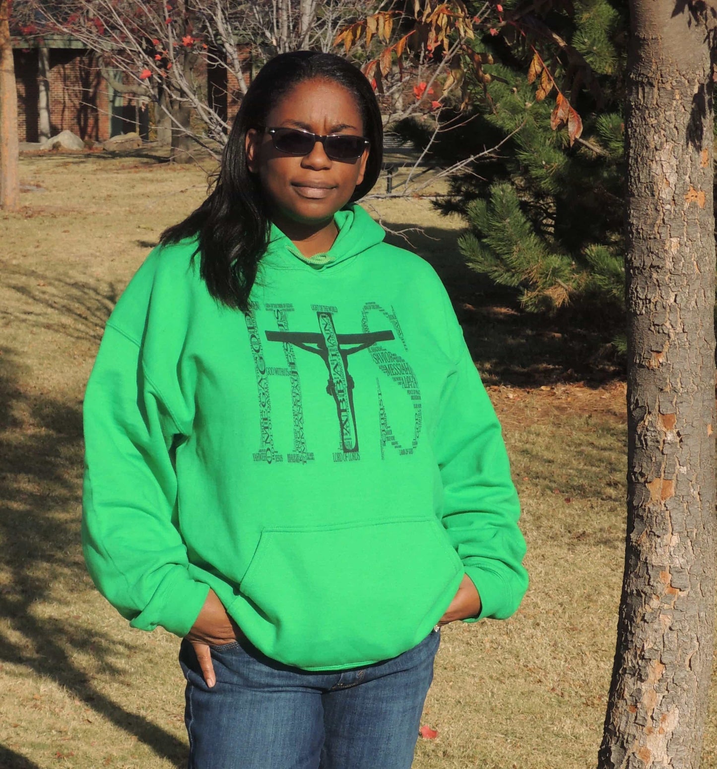 Names of God- (I AM) His -Hooded Sweatshirt Irish Green on woman in shades outdoors