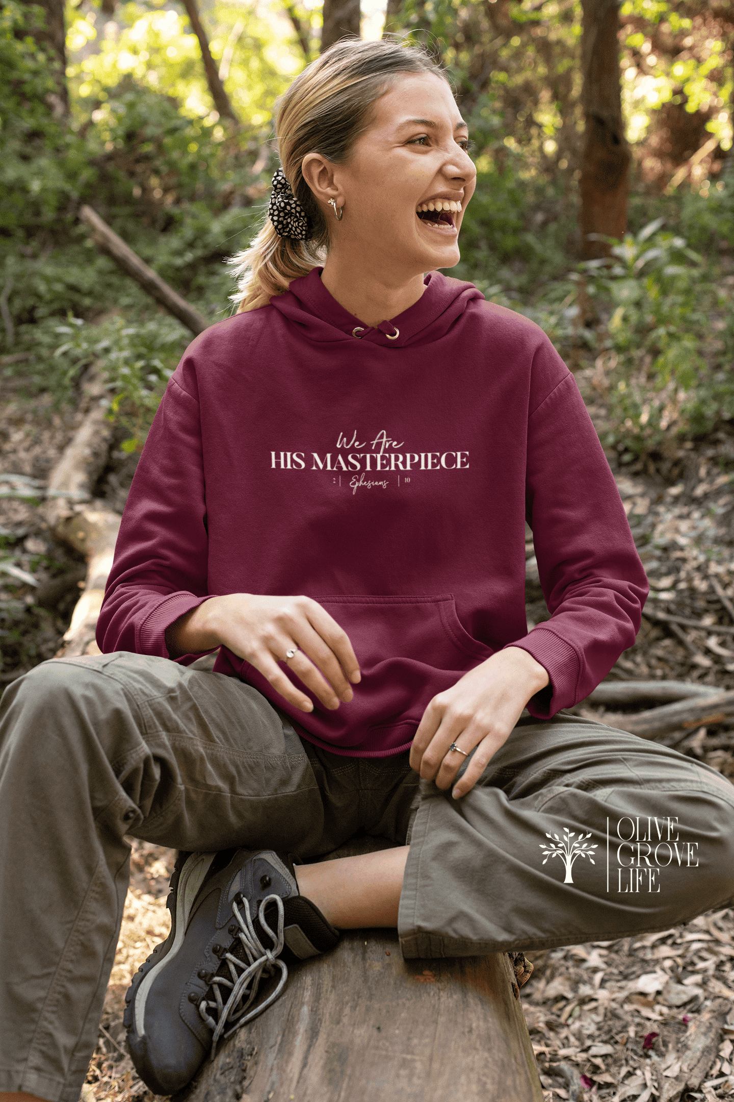 Ephesians 2:10 His Masterpiece Unisex Hoodie Maroon on woman 