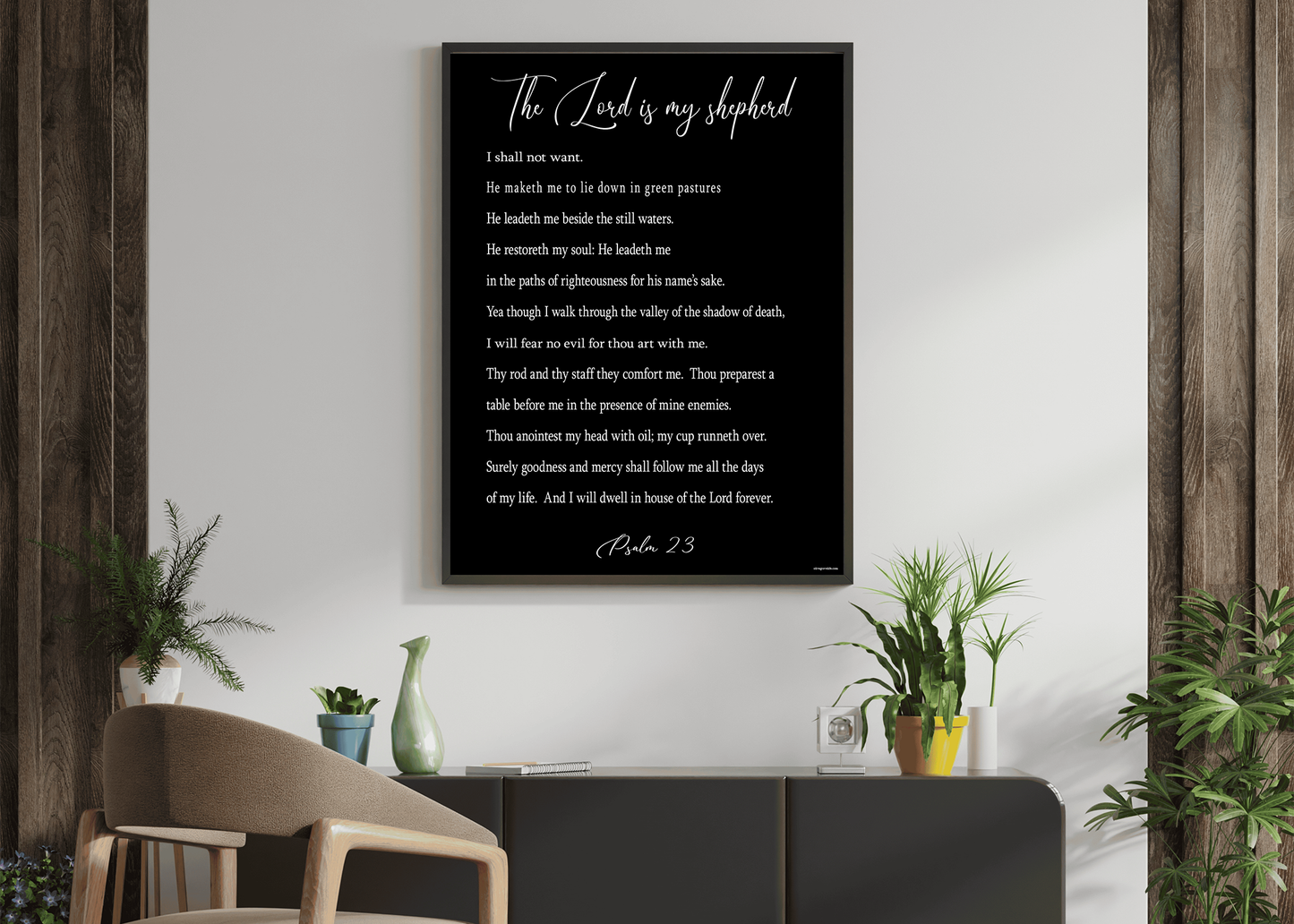 Hanging on the wall above a table is the Psalm 23 Art Print by Olive Grove Life in a modern living space.