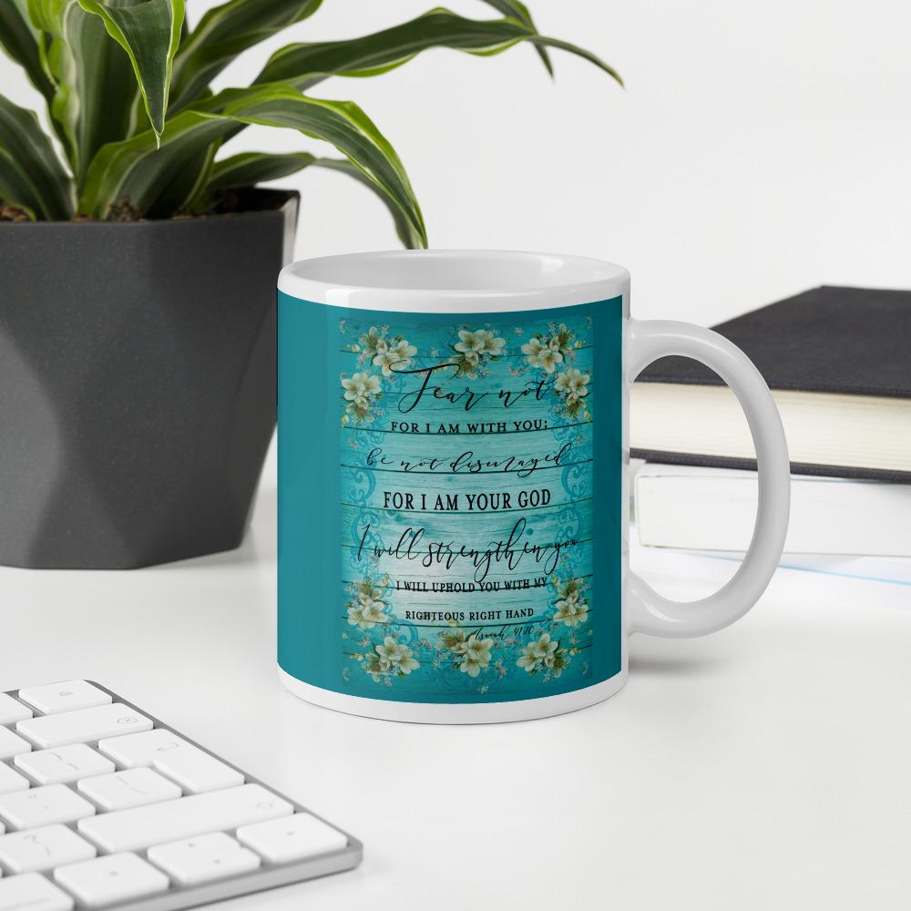 Isaiah 41 And 10 Fear Not Floral Mug with plant, keyboard, and books