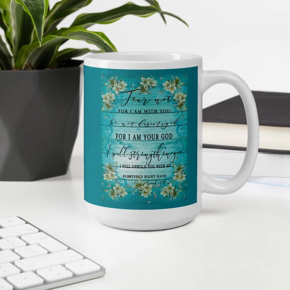 Isaiah 41:10 Fear Not Floral Mug with plant, keyboard, and books